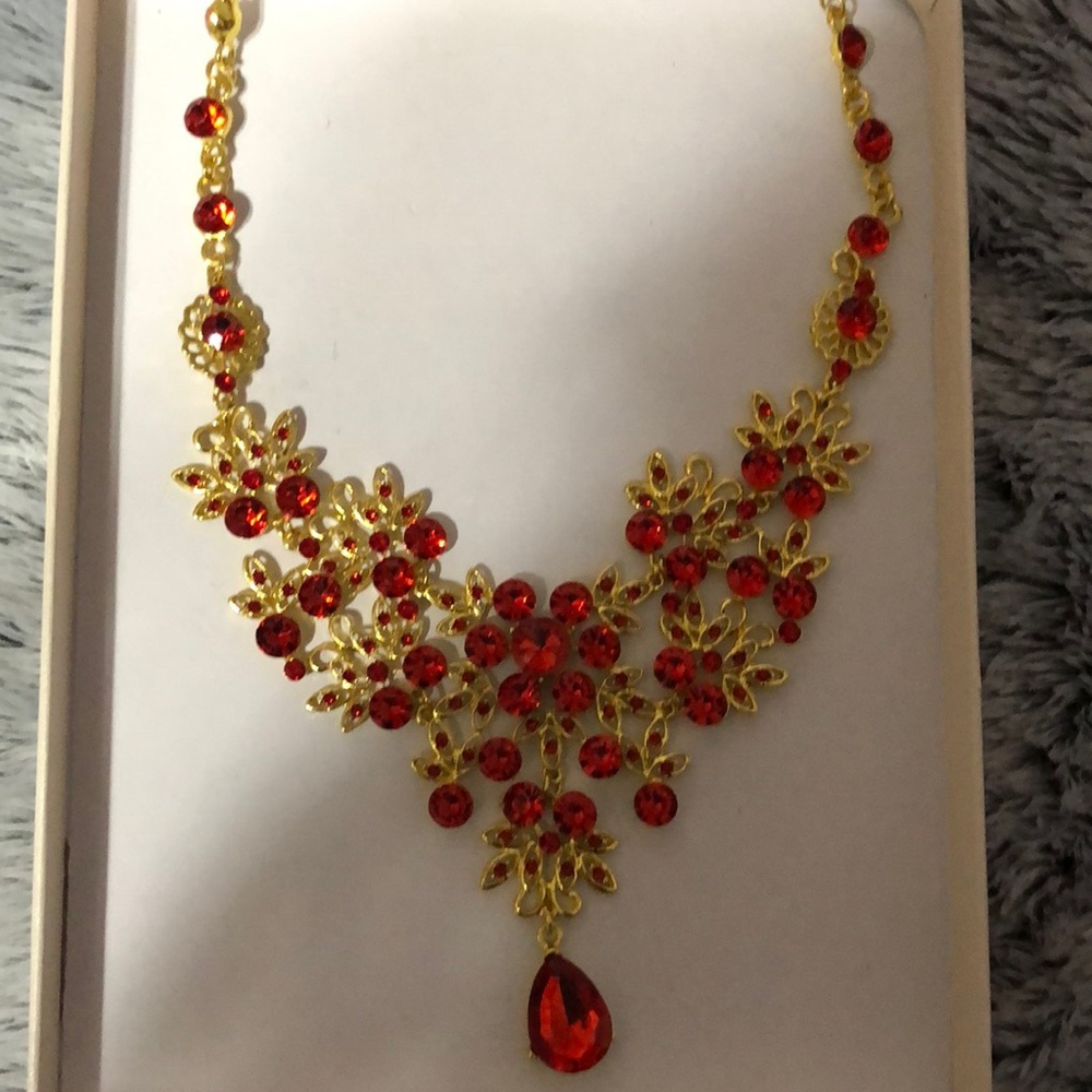 Gold and red necklace